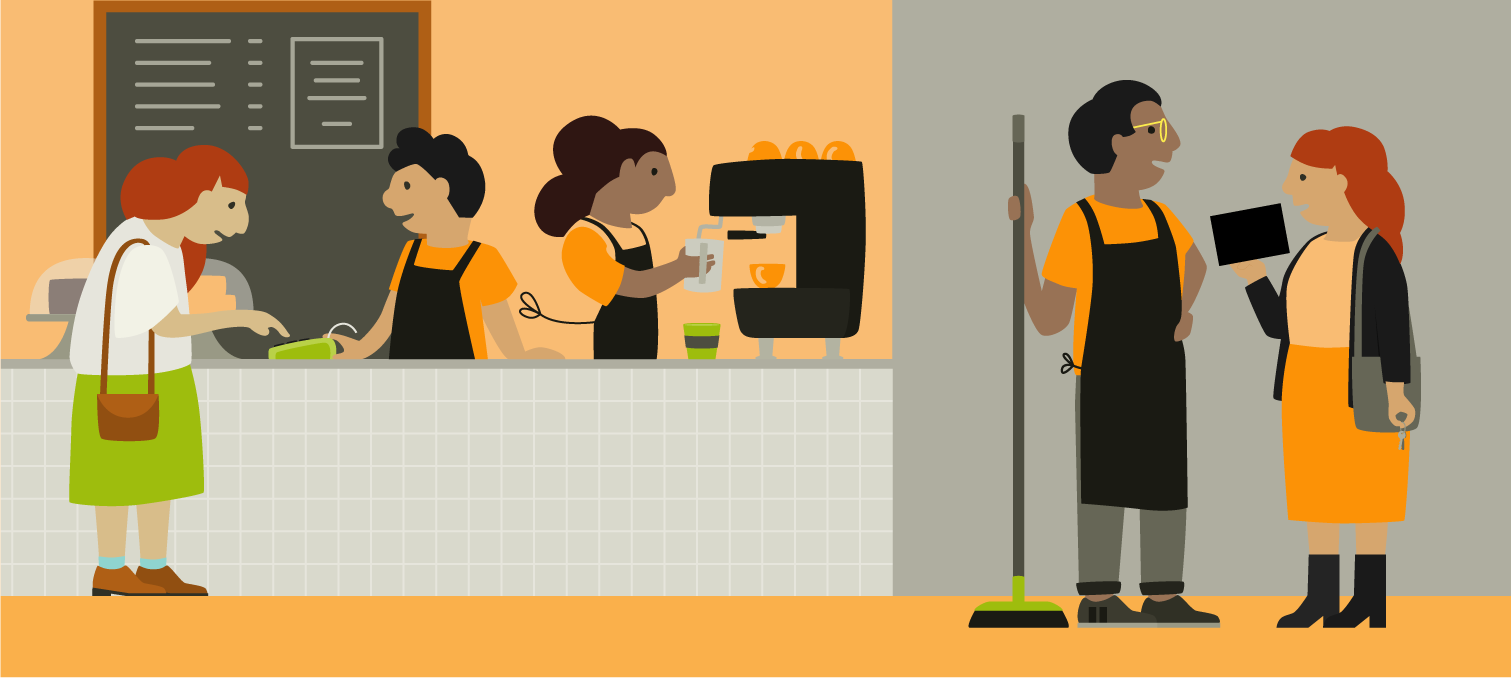 A busy café with a manager talking to a worker about their plan